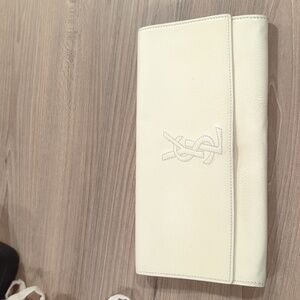 YSL cream patent clutch